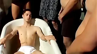 Cock sucking twink enjoys his personal golden shower orgy